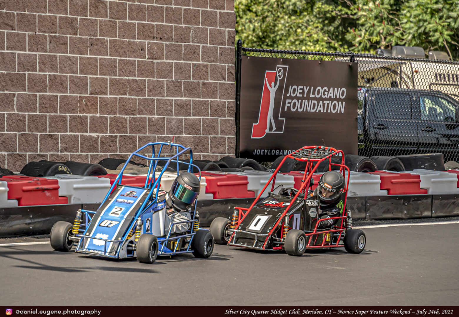 Two Go Karting Vehicles in Blue and Red Color