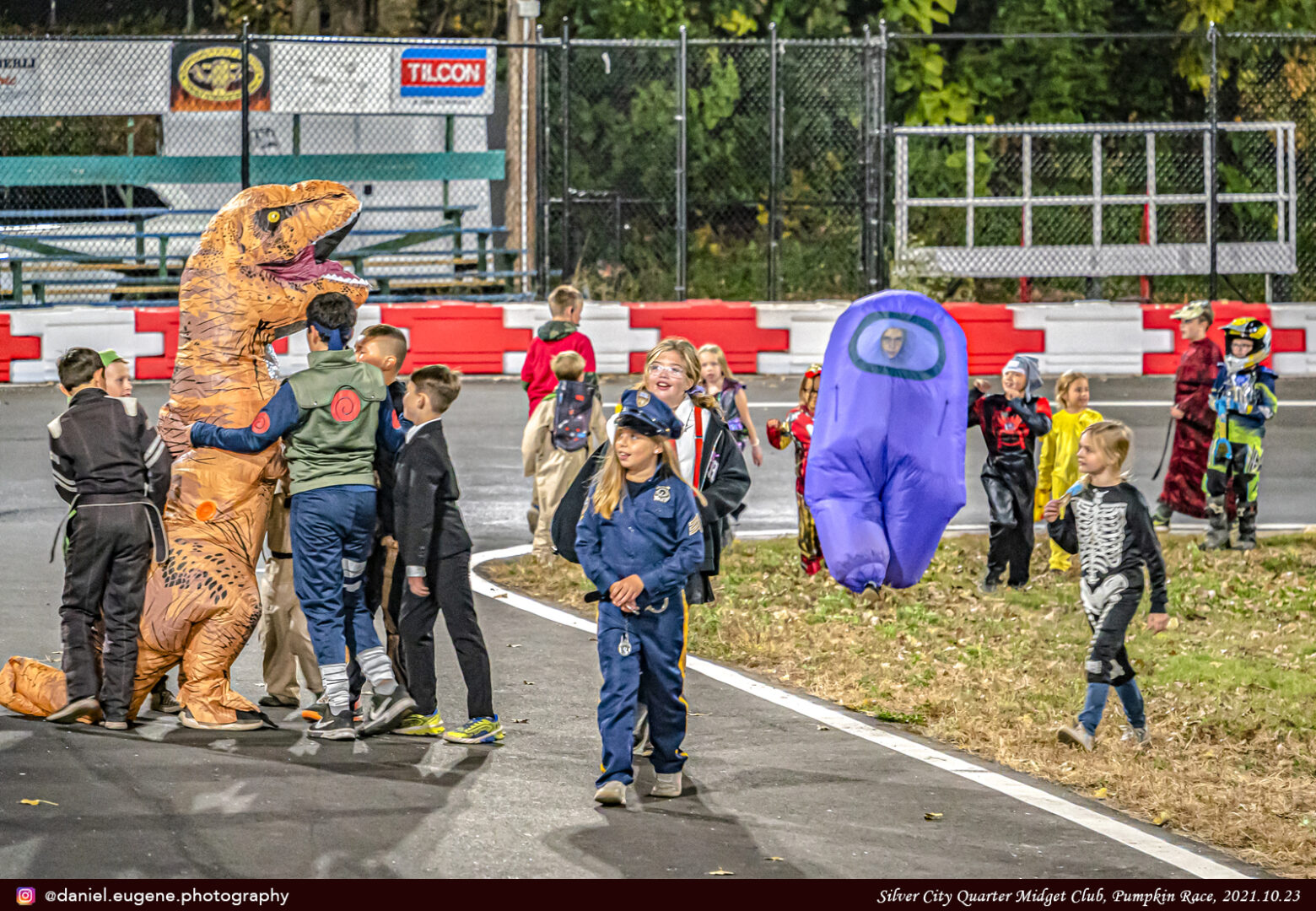 Kids in Halloween Costume on a Racing Track